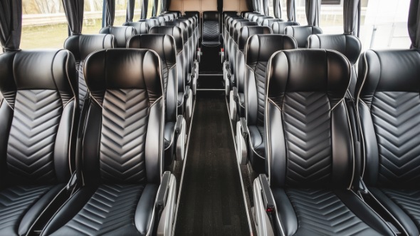 54 passenger charter bus rental clifton